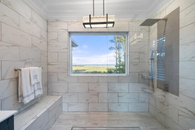 Escape to a truly exceptional Lowcountry retreat where privacy on Pawleys Plantation Golf and Country Club in South Carolina - for sale on GolfHomes.com, golf home, golf lot