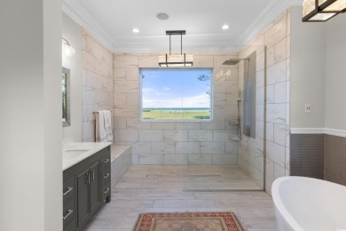 Escape to a truly exceptional Lowcountry retreat where privacy on Pawleys Plantation Golf and Country Club in South Carolina - for sale on GolfHomes.com, golf home, golf lot