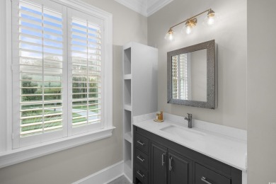 Escape to a truly exceptional Lowcountry retreat where privacy on Pawleys Plantation Golf and Country Club in South Carolina - for sale on GolfHomes.com, golf home, golf lot