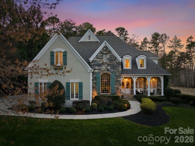 Set on a private golf course lot overlooking the 6th hole, this on Trump National Golf Club Charlotte in North Carolina - for sale on GolfHomes.com, golf home, golf lot