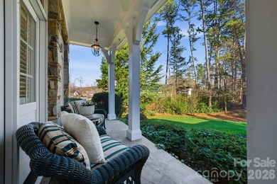 Set on a private golf course lot overlooking the 6th hole, this on Trump National Golf Club Charlotte in North Carolina - for sale on GolfHomes.com, golf home, golf lot