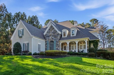Set on a private golf course lot overlooking the 6th hole, this on Trump National Golf Club Charlotte in North Carolina - for sale on GolfHomes.com, golf home, golf lot