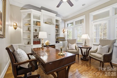 Set on a private golf course lot overlooking the 6th hole, this on Trump National Golf Club Charlotte in North Carolina - for sale on GolfHomes.com, golf home, golf lot