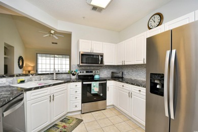 This Portofino condo provides a great open living space with on Barefoot Resort and Golf Club  in South Carolina - for sale on GolfHomes.com, golf home, golf lot