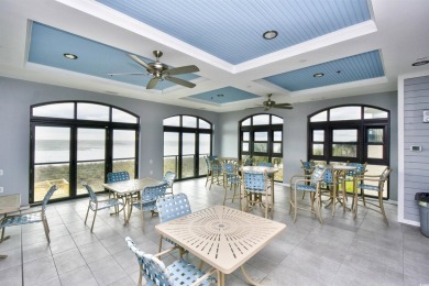 This Portofino condo provides a great open living space with on Barefoot Resort and Golf Club  in South Carolina - for sale on GolfHomes.com, golf home, golf lot