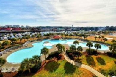 This Portofino condo provides a great open living space with on Barefoot Resort and Golf Club  in South Carolina - for sale on GolfHomes.com, golf home, golf lot