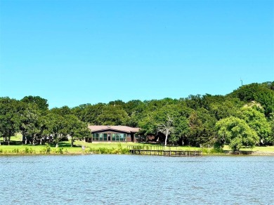 Walk out the back door and straight into Lake Nocona! You could on Nocona Hills Golf Course in Texas - for sale on GolfHomes.com, golf home, golf lot