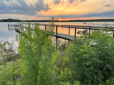 Walk out the back door and straight into Lake Nocona! You could on Nocona Hills Golf Course in Texas - for sale on GolfHomes.com, golf home, golf lot