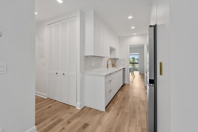 Beautifully renovated and move-in ready, this 3-bedroom, 3-bath on Palm Beach Polo and Country Club in Florida - for sale on GolfHomes.com, golf home, golf lot