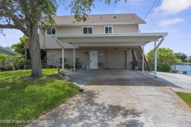 Welcome to your coastal escape in Hudson Beach Estates! This on Heritage Pines Country Club in Florida - for sale on GolfHomes.com, golf home, golf lot