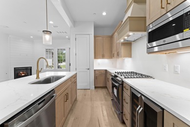 Discover the epitome of upscale living at the Townhomes at the on Sharks Tooth Golf Club in Florida - for sale on GolfHomes.com, golf home, golf lot