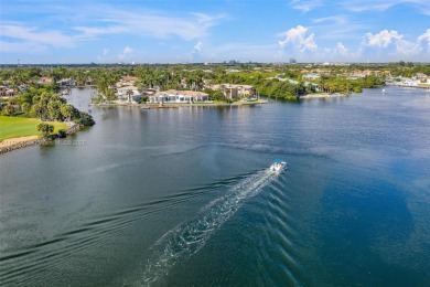 Beautiful waterfront property on a point lot with 260' of on North Palm Beach Country Club in Florida - for sale on GolfHomes.com, golf home, golf lot