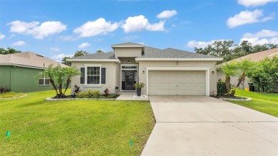 Welcome to 4565 Fairway Oaks Drive - a stunning 4-bedroom on Imperial Lakes Country Club in Florida - for sale on GolfHomes.com, golf home, golf lot