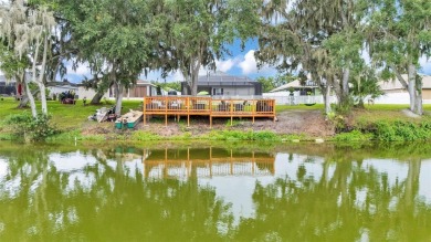 Welcome to 4565 Fairway Oaks Drive - a stunning 4-bedroom on Imperial Lakes Country Club in Florida - for sale on GolfHomes.com, golf home, golf lot
