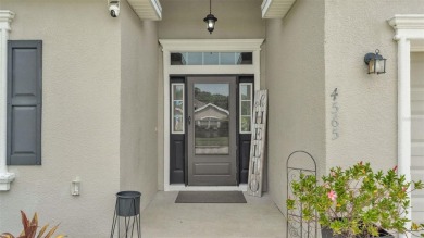 Welcome to 4565 Fairway Oaks Drive - a stunning 4-bedroom on Imperial Lakes Country Club in Florida - for sale on GolfHomes.com, golf home, golf lot