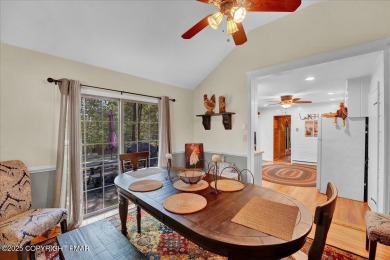 Rustic mountain escape with warm wood features! This 3 bedroom on Split Rock Resort and Country Club in Pennsylvania - for sale on GolfHomes.com, golf home, golf lot