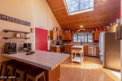 Looking for the perfect escape in nature? This fully furnished on Pinetop Lakes Golf and Country Club in Arizona - for sale on GolfHomes.com, golf home, golf lot