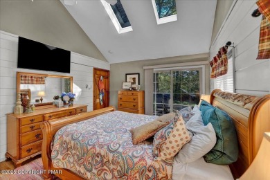 Rustic mountain escape with warm wood features! This 3 bedroom on Split Rock Resort and Country Club in Pennsylvania - for sale on GolfHomes.com, golf home, golf lot