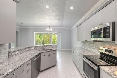Welcome to this pristine and nearly new residence nestled in the on LPGA International Golf Course in Florida - for sale on GolfHomes.com, golf home, golf lot