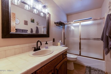 Looking for the perfect escape in nature? This fully furnished on Pinetop Lakes Golf and Country Club in Arizona - for sale on GolfHomes.com, golf home, golf lot