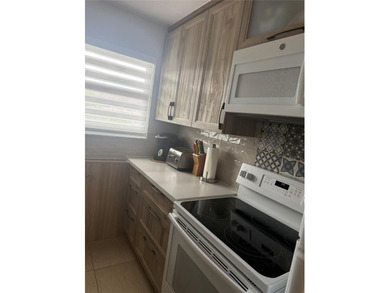 Gorgeous condo completely remodeled, sold totally furnish on Sunrise Lakes Phase III in Florida - for sale on GolfHomes.com, golf home, golf lot