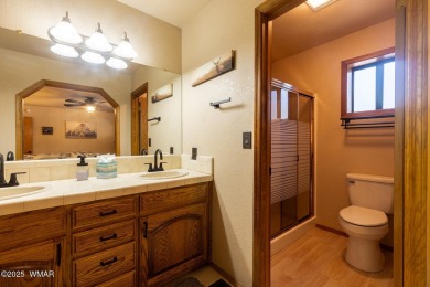 Looking for the perfect escape in nature? This fully furnished on Pinetop Lakes Golf and Country Club in Arizona - for sale on GolfHomes.com, golf home, golf lot
