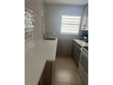 Gorgeous condo completely remodeled, sold totally furnish on Sunrise Lakes Phase III in Florida - for sale on GolfHomes.com, golf home, golf lot