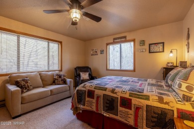 Looking for the perfect escape in nature? This fully furnished on Pinetop Lakes Golf and Country Club in Arizona - for sale on GolfHomes.com, golf home, golf lot