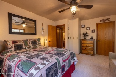 Looking for the perfect escape in nature? This fully furnished on Pinetop Lakes Golf and Country Club in Arizona - for sale on GolfHomes.com, golf home, golf lot