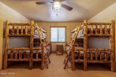 Looking for the perfect escape in nature? This fully furnished on Pinetop Lakes Golf and Country Club in Arizona - for sale on GolfHomes.com, golf home, golf lot