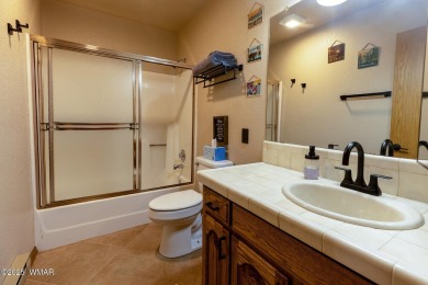 Looking for the perfect escape in nature? This fully furnished on Pinetop Lakes Golf and Country Club in Arizona - for sale on GolfHomes.com, golf home, golf lot
