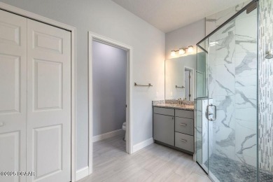 Welcome to this pristine and nearly new residence nestled in the on LPGA International Golf Course in Florida - for sale on GolfHomes.com, golf home, golf lot