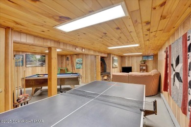Rustic mountain escape with warm wood features! This 3 bedroom on Split Rock Resort and Country Club in Pennsylvania - for sale on GolfHomes.com, golf home, golf lot