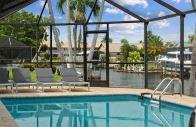 Welcome to your luxury waterfront oasis in Southwest Cape Coral on Royal Tee Country Club in Florida - for sale on GolfHomes.com, golf home, golf lot