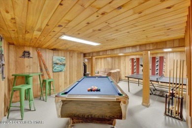 Rustic mountain escape with warm wood features! This 3 bedroom on Split Rock Resort and Country Club in Pennsylvania - for sale on GolfHomes.com, golf home, golf lot