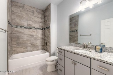 Welcome to this pristine and nearly new residence nestled in the on LPGA International Golf Course in Florida - for sale on GolfHomes.com, golf home, golf lot