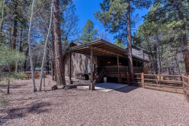 Looking for the perfect escape in nature? This fully furnished on Pinetop Lakes Golf and Country Club in Arizona - for sale on GolfHomes.com, golf home, golf lot