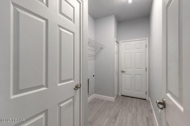 Welcome to this pristine and nearly new residence nestled in the on LPGA International Golf Course in Florida - for sale on GolfHomes.com, golf home, golf lot