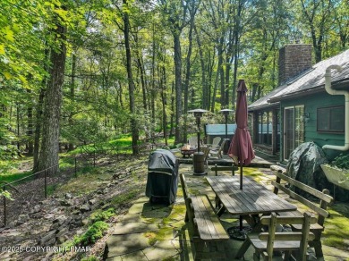 Rustic mountain escape with warm wood features! This 3 bedroom on Split Rock Resort and Country Club in Pennsylvania - for sale on GolfHomes.com, golf home, golf lot