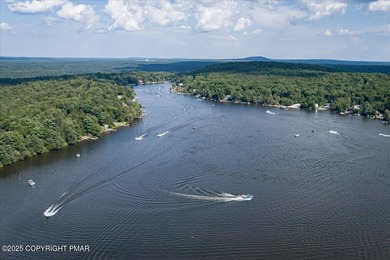 Rustic mountain escape with warm wood features! This 3 bedroom on Split Rock Resort and Country Club in Pennsylvania - for sale on GolfHomes.com, golf home, golf lot