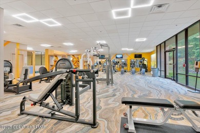 Rustic mountain escape with warm wood features! This 3 bedroom on Split Rock Resort and Country Club in Pennsylvania - for sale on GolfHomes.com, golf home, golf lot