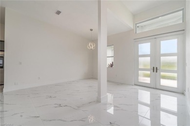 Welcome to effortless luxury in the coveted Royal Palm Golf on Eagle Lakes Golf Club in Florida - for sale on GolfHomes.com, golf home, golf lot