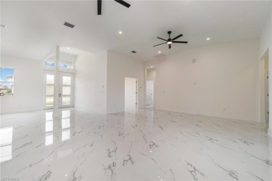 Welcome to effortless luxury in the coveted Royal Palm Golf on Eagle Lakes Golf Club in Florida - for sale on GolfHomes.com, golf home, golf lot