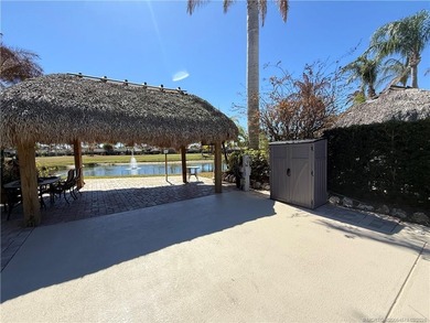 Nestled within an exclusive gated RV resort, this exceptional on St. Lucie Trail Golf Club in Florida - for sale on GolfHomes.com, golf home, golf lot