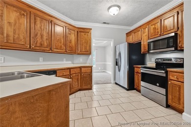 This two bedroom, two bathroom brick townhome located in the on Baywood Golf Club in North Carolina - for sale on GolfHomes.com, golf home, golf lot