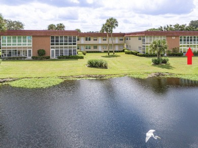 Desirable ''B'' unit overlooking the lake and the golf course. A on The American Golf Club in Florida - for sale on GolfHomes.com, golf home, golf lot