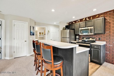 Welcome HOME to the distinguished and privately gated coastal on Members Club At St. James Plantation in North Carolina - for sale on GolfHomes.com, golf home, golf lot