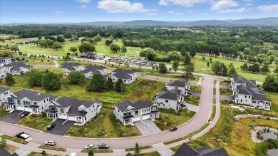 Enjoy refined living in this exquisitely crafted townhome in the on Kwiniaska Golf Club in Vermont - for sale on GolfHomes.com, golf home, golf lot