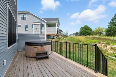 Enjoy refined living in this exquisitely crafted townhome in the on Kwiniaska Golf Club in Vermont - for sale on GolfHomes.com, golf home, golf lot