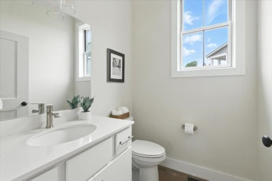 Enjoy refined living in this exquisitely crafted townhome in the on Kwiniaska Golf Club in Vermont - for sale on GolfHomes.com, golf home, golf lot